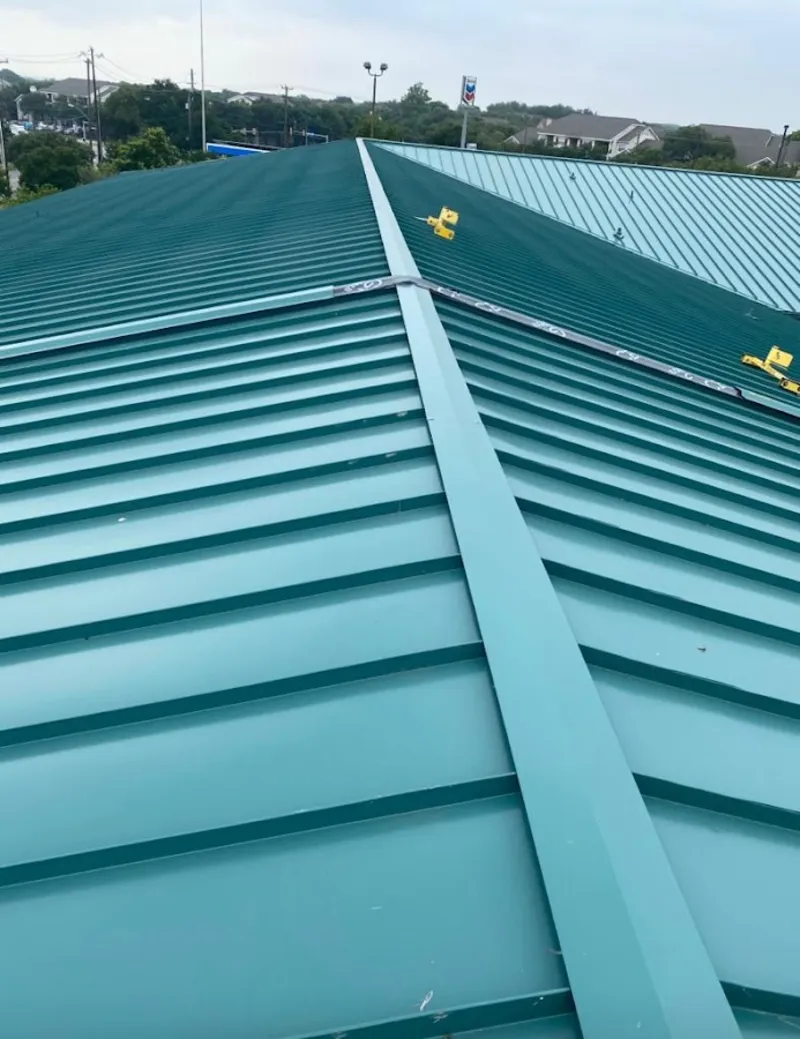 Green commercial metal roof ridge and valley for Metal Roof Repair in Larkspur